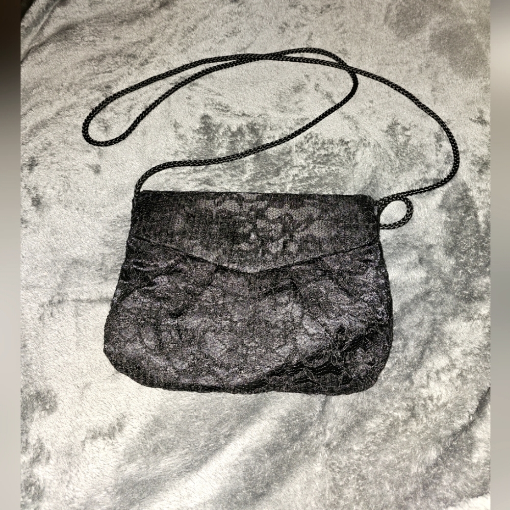 VGUC cross straps lace covered bag with crossstrap.
